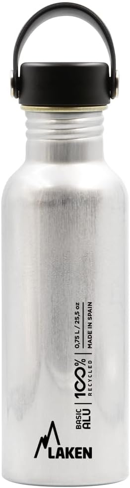 Pavo Monitor Arm installed on a wooden desk showing adjustable height