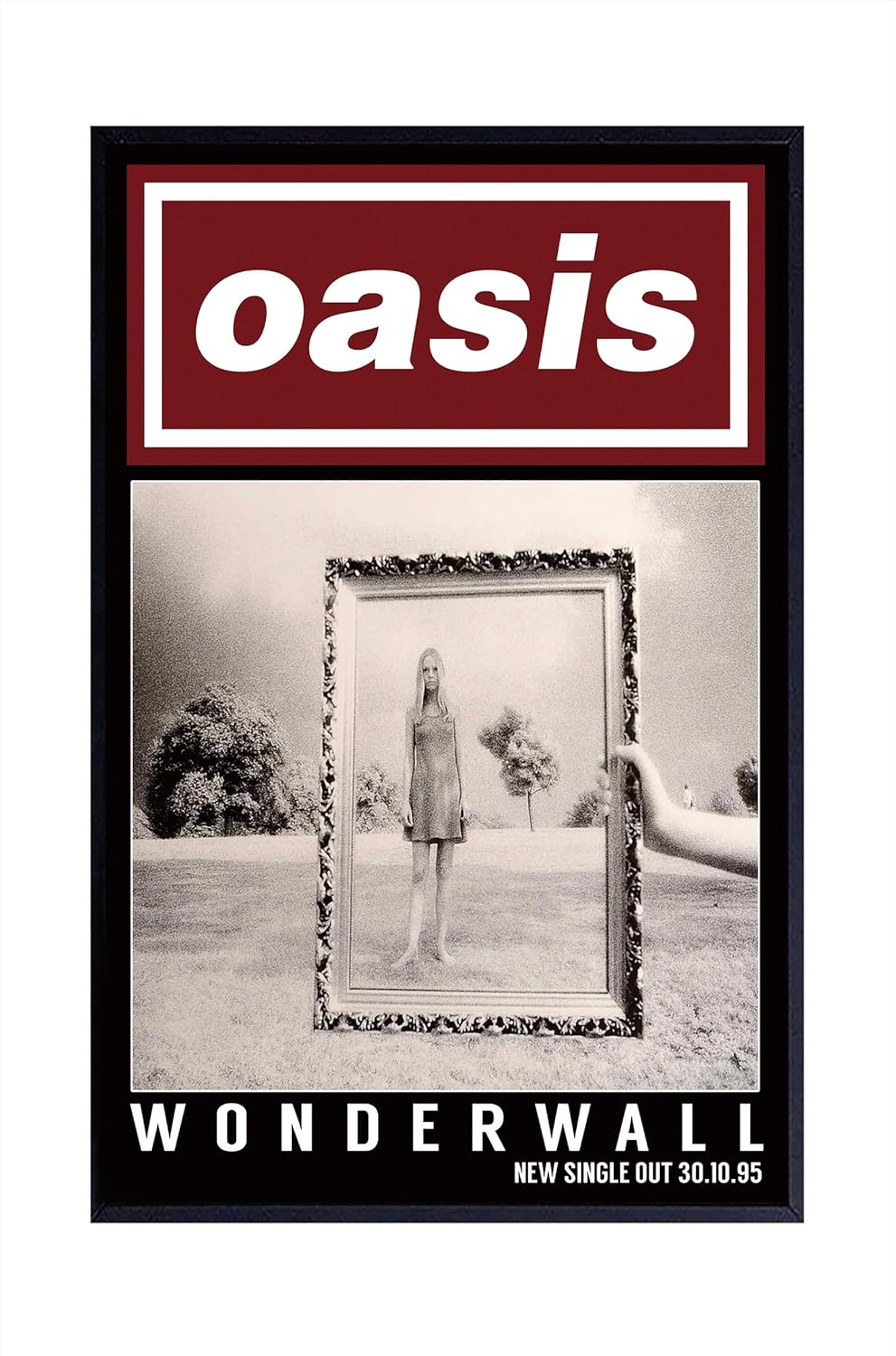 Pavo Monitor Arm mounted on a wooden office desk